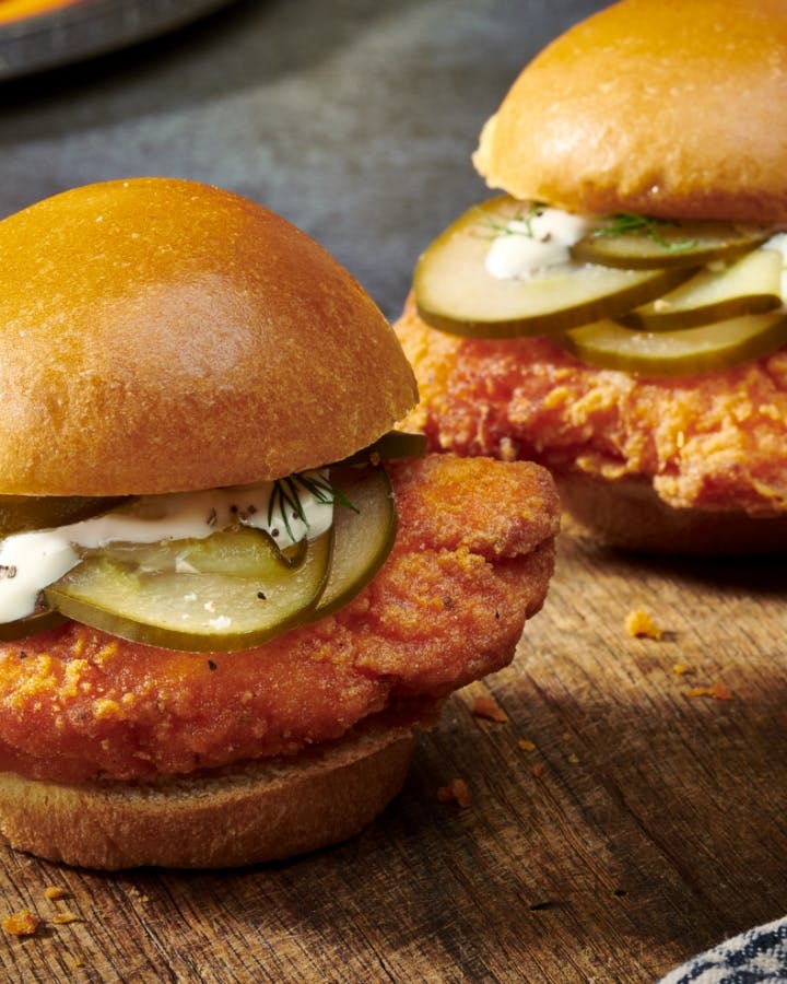 Chicken sliders on a wood table